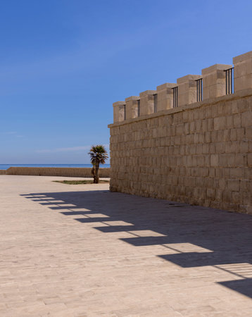 Syracuse, Sicily, Italy - April 29, 2023: View of defensive wall of Vigliena Fort in the Ionian Sea...