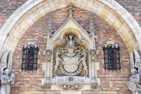 Bruges, Belgium - May 19, 2023: Sculpture on facade of entrance gate to Gruuthuse Museum (Gruuthusemuseum)の写真素材