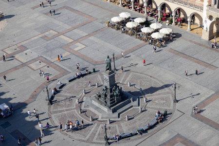 Krakow, Poland - September 9, 2023: Aerial view from tower of St. Mary's Church of Polish poet Adam Mickiewicz Monument and Cloth Hall (Sukiennice)のeditorial素材
