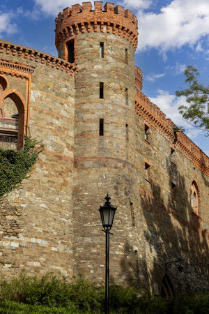 Kamieniec Zabkowicki, Poland - October 2, 2021: Kamieniec Zabkowicki Palace, 19th-century palace located in a village in the Lower Silesian Voivodeship. Fragment of the wall surrounding the buildingのeditorial素材