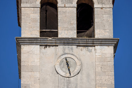 Pula, Croatia, Istria - September 29, 2023: Clock tower of Pula Cathedral, medieval church located...