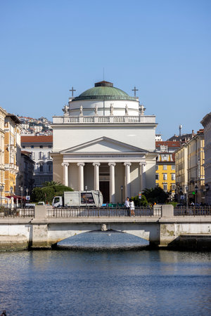 Trieste, Italy - September 26, 2023: Facade of neoclassical Church of Sant'Antonio Taumaturgo also called Church of Sant'Antonio Nuovo located at the end of Grand Canalのeditorial素材