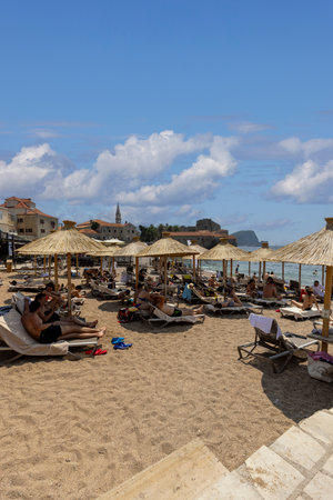 Budva, Montenegro - June 28, 2023: Ricardova Glava Beach by Adriatic Sea located at the City Wallsのeditorial素材