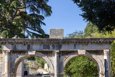 Pula, Croatia, Istria - September 29, 2023: Porta Gemina (Dvojna vrata), remains of Roman city gateのeditorial素材