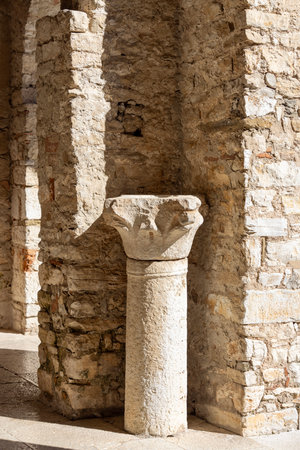 Porec, Croatia, Istria - September 25, 2023: Medieval Euphrasian Basilica, roman catholic church in Byzantine style. Decorative column in the courtyardのeditorial素材