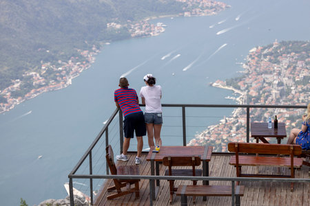 Kotor, Montenegro - June 26, 2023: People on observation deck on the top of the mountain with beautiful view of Kotor of the Adriatic Sea.のeditorial素材