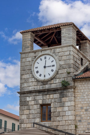 Kotor, Montenegro - June 26, 2023: Medieval Clock Tower on Arms Squareのeditorial素材
