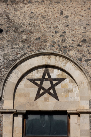 Catania, Sicily, Italy - April 26, 2023: Star of David on facade of Castello Ursino. It is one of the relics of the Jewish past of the cityのeditorial素材