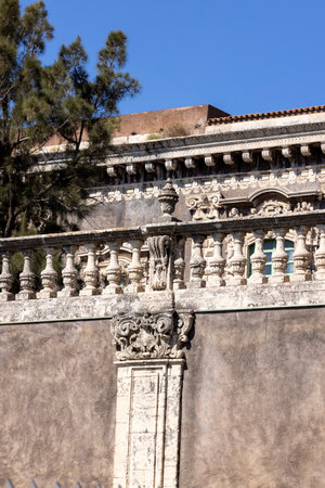 Catania, Sicily, Italy - April 26, 2023: Detail of decorative wall surrounding medieval Benedictine Monastery of San Nicolo l'Arena, now University of Cataniaのeditorial素材