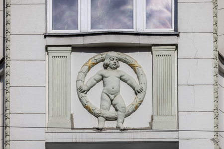 Lodz, Poland - May 4, 2023: Piotrkowska street, famous cult place, the main thoroughfare in the city, decorative facades of tenement houses and palaces of rich 19th-century manufacturersのeditorial素材