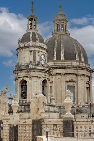 Catania, Sicily, Italy - April 30, 2023: Dome and bell tower of baroque Catania Cathedra (Metropolitan Cathedral of Saint Agatha) in Piazza Duomoの写真素材