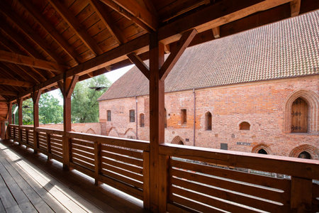 Ostroda, Poland - July 26, 2020: Courtyard of 14th century Teutonic order Ostroda Castle, red brick fortress built by Crusaders. It now houses museum and knights' brotherhoodのeditorial素材