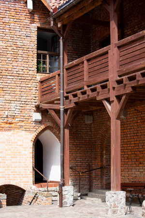 Ostroda, Poland - July 26, 2020: Courtyard of 14th century Teutonic order Ostroda Castle, red brick fortress built by Crusaders. It now houses museum and knights' brotherhoodのeditorial素材