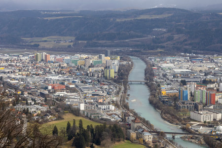 Innsbruck, Tyrol, Austria - February 25, 2023: Aerial view from Hermann Buhl square of the city with Inn Riverのeditorial素材