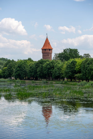 Malbork, Poland - June 25, 2020: Buttermilk Tower (Maslankowa Tower) in 13th century gothic Malbork Castle, medieval Teutonic fortress on Nogat Riverの写真素材