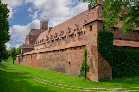 Malbork, Poland - June 25, 2020: 13th century Malbork Castle, medieval Teutonic fortress on the Nogat River. It is the largest gothic castle in the world, UNESCO World Heritage Siteのeditorial素材