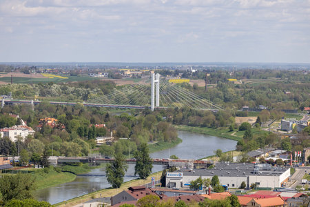 Przemysl, Poland - May 1, 2025: Aerial view from Przemysl Castle of city with Przemysl Gate Bridge, road bridge over San River. Bypass facilitates access to border crossing with Ukraine in Medykaのeditorial素材