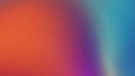 Abstract gradient background with soft light effect and grain texture, featuring various orange, purple, and blue colorsの写真素材