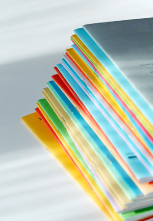 A few brochures of different colours.