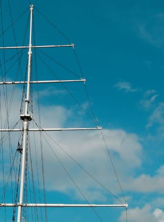 The mast of the yacht against sky.の写真素材