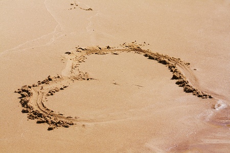 The shape of a heart on a sand.の写真素材
