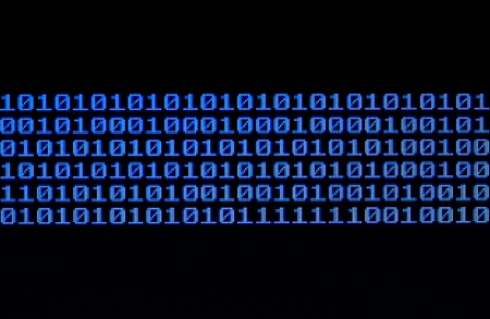 Binary code on a computer monitor.の写真素材