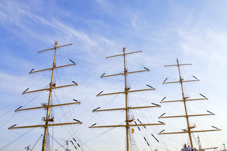The masts of the yachts against sky.