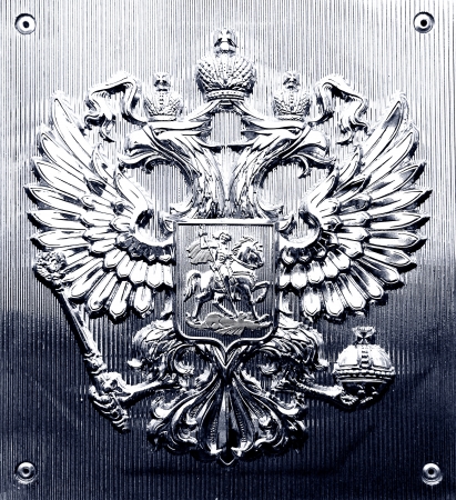 The Russian coat of arms on a metall tablet.の写真素材