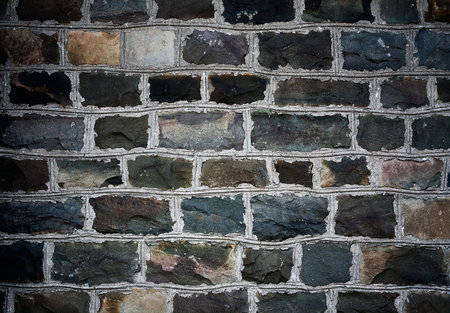 The fragment of ancient wall of brick close-up 