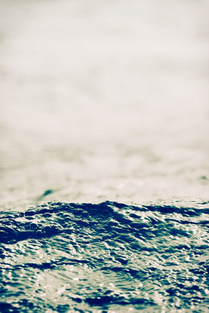 sea wave close up, low angle view, cross processing effect