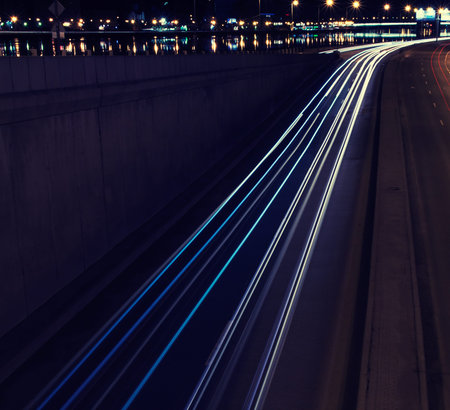 abstract image of blur motion of cars on the city road at night