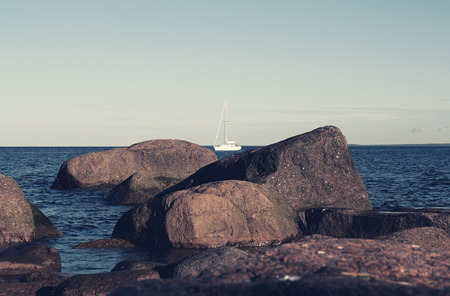 sailing yacht, open sea in a clear summer day, vintage retro color style photoの写真素材