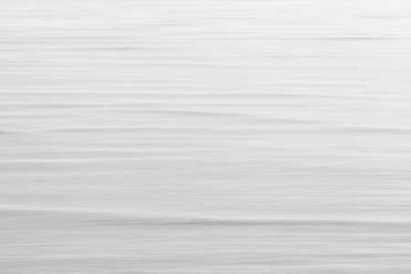 white texture, calm sea surface, black and white photoの写真素材