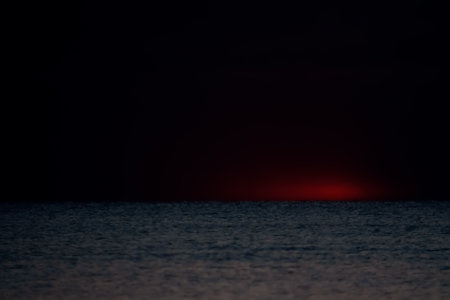 sunset over the sea in summer, dramatic nightの写真素材