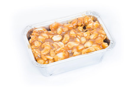 chocolate-cake in the package silver on white background