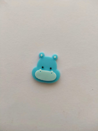 cute cartoon blue hippo head charm illustration accessoryの写真素材