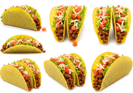 Delicious Mexican tacos filled with meat, cheese, and fresh vegetableの素材