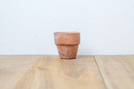 flower pot on wooden boardの写真素材