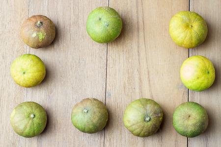 many lime on wood boardの写真素材