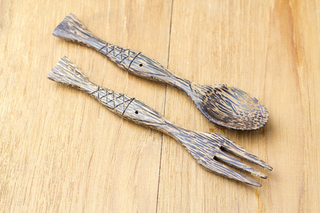 wood spoon and folk on wood backgroundの写真素材