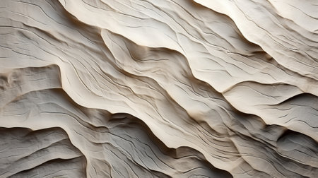 A mesmerizing portrayal of the delicate intricacies of nature, captured in the rippling patterns of a windswept sand duneの素材