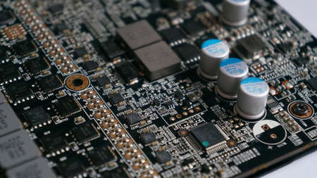 Electronic circuit board close-up. Electronic hardware technology. Motherboard digital chip.の写真素材