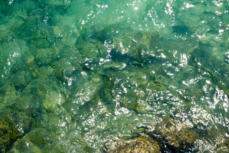 Green ripple water wave in sea ocean.の写真素材