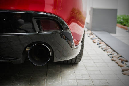 Sportive mufflers. Round Car Exhaust Pipe chromed made of stainless steelの写真素材
