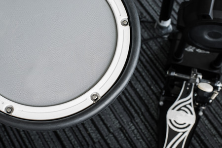 Electronic drum set in a small roomの写真素材