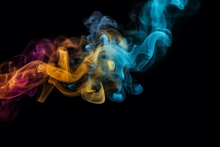Colorful smoke isolated on black background. Abstract background of colorful smokeの素材