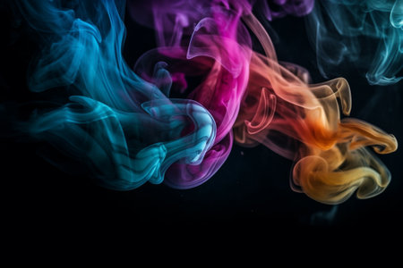 Colorful smoke isolated on black background. Abstract background for design.の素材