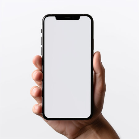 male hand holding a smartphone with a blank screen on a white backgroundの素材