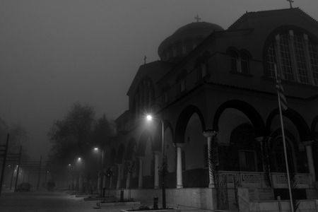 Church Covered With Fog At Nightの写真素材