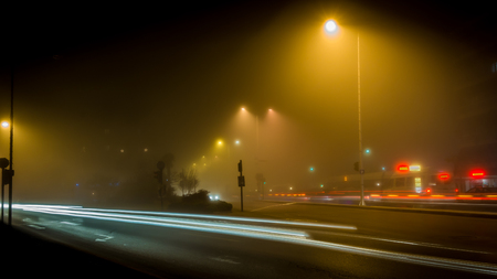 Light Trails At A Foggy Nightの写真素材